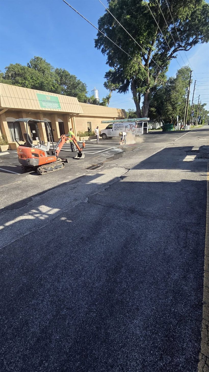 Freshly repaved road after a Johnny Gonzalez Plumbing water main replacement in DeLand